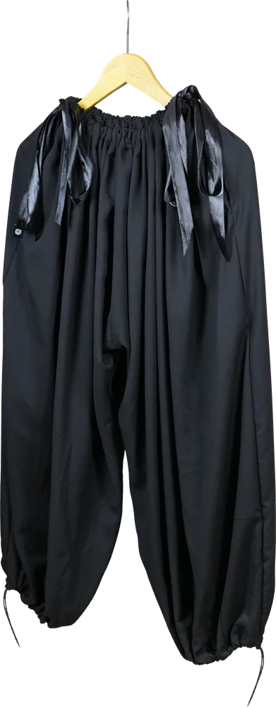 The Balloon Trousers on a hanger