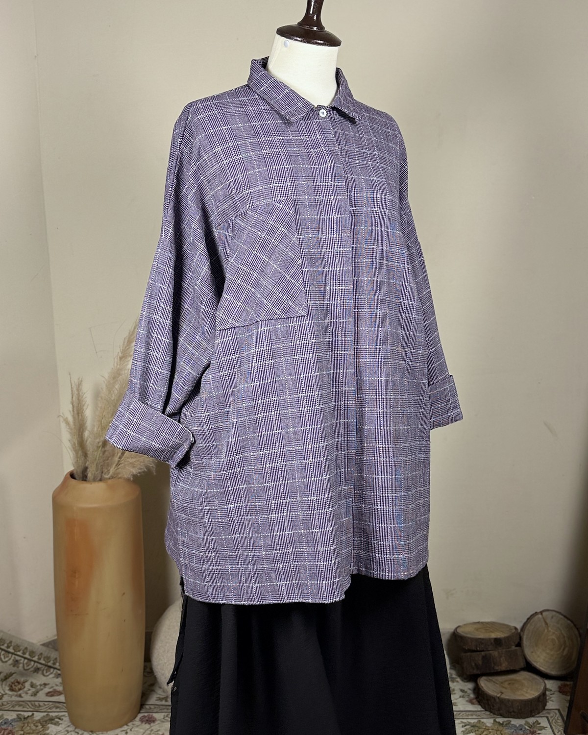 The Maxi Skirt beneath the Windowpane Shirt on a dress form